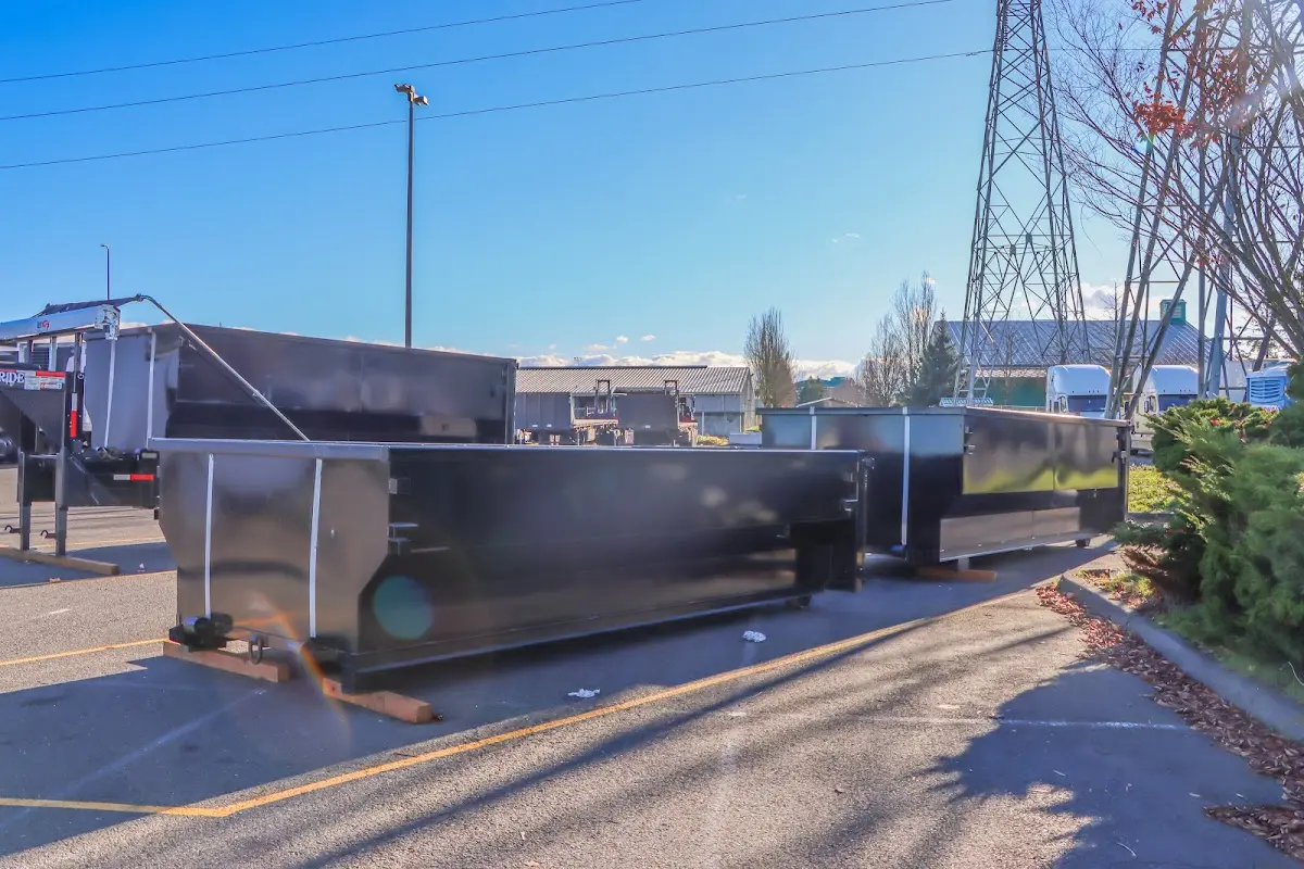 Roll-off dumpster ready for waste disposal at job site for 3 Yard Dumpster Rental in Snellville